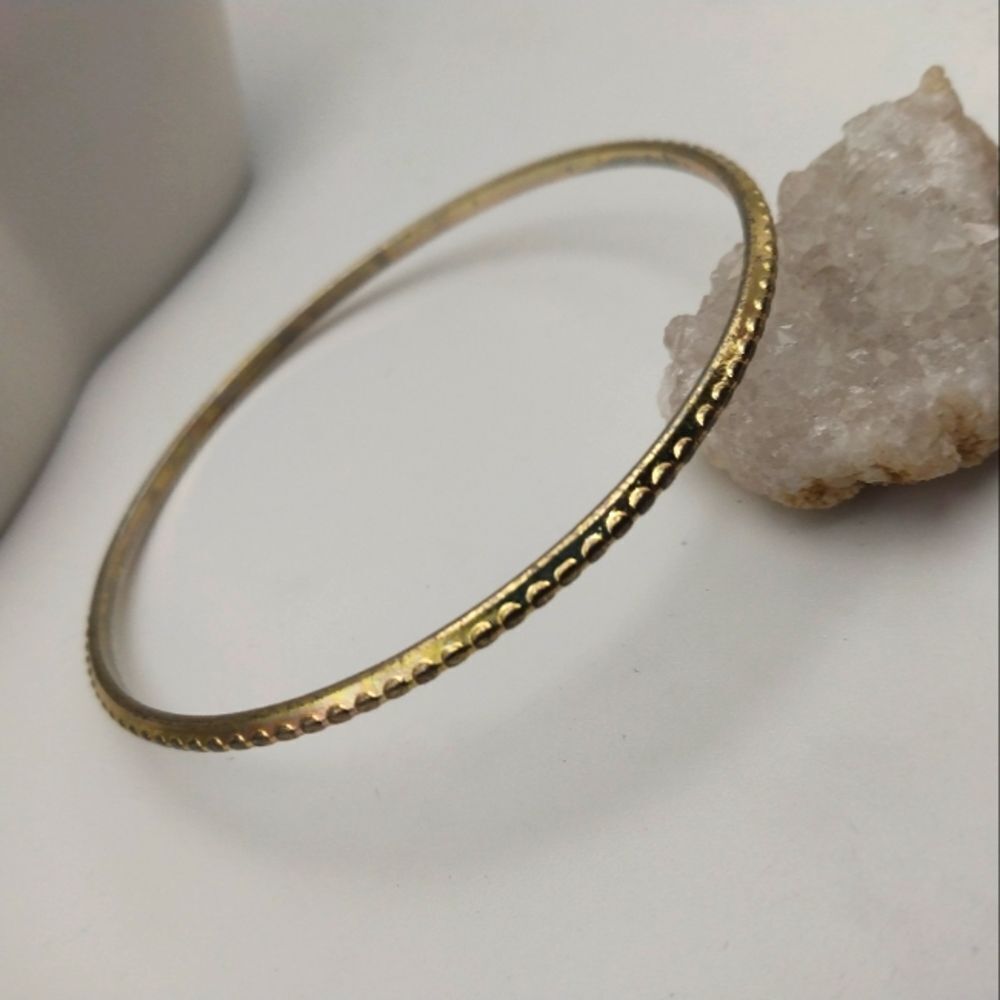 Gold toned bangle‎